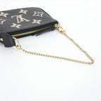 Louis Vuitton Bicolor Monogram Empreinte Mini Pochette Pouch — view 4