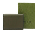 Gucci Embossed Logo Leather Trifold Wallet
