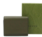 Gucci Embossed Logo Leather Trifold Wallet