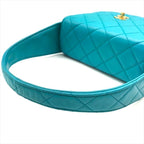 Chanel CC Logo Turnlock Quilted Lambskin Mini Hand Vanity Bag Blue — view 6