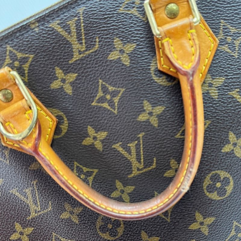 Louis Vuitton Monogram Alma Bag Handbag Brown — view 9