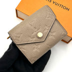 Louis Vuitton Monogram Empreinte Zoe Trifold Wallet Tourterelle