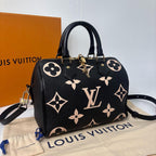 Louis Vuitton Monogram Empreinte Speedy 25 Handbag — view 3