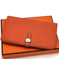 Hermes Wallet Dogon GM Taurillon Clemence Orange Silver