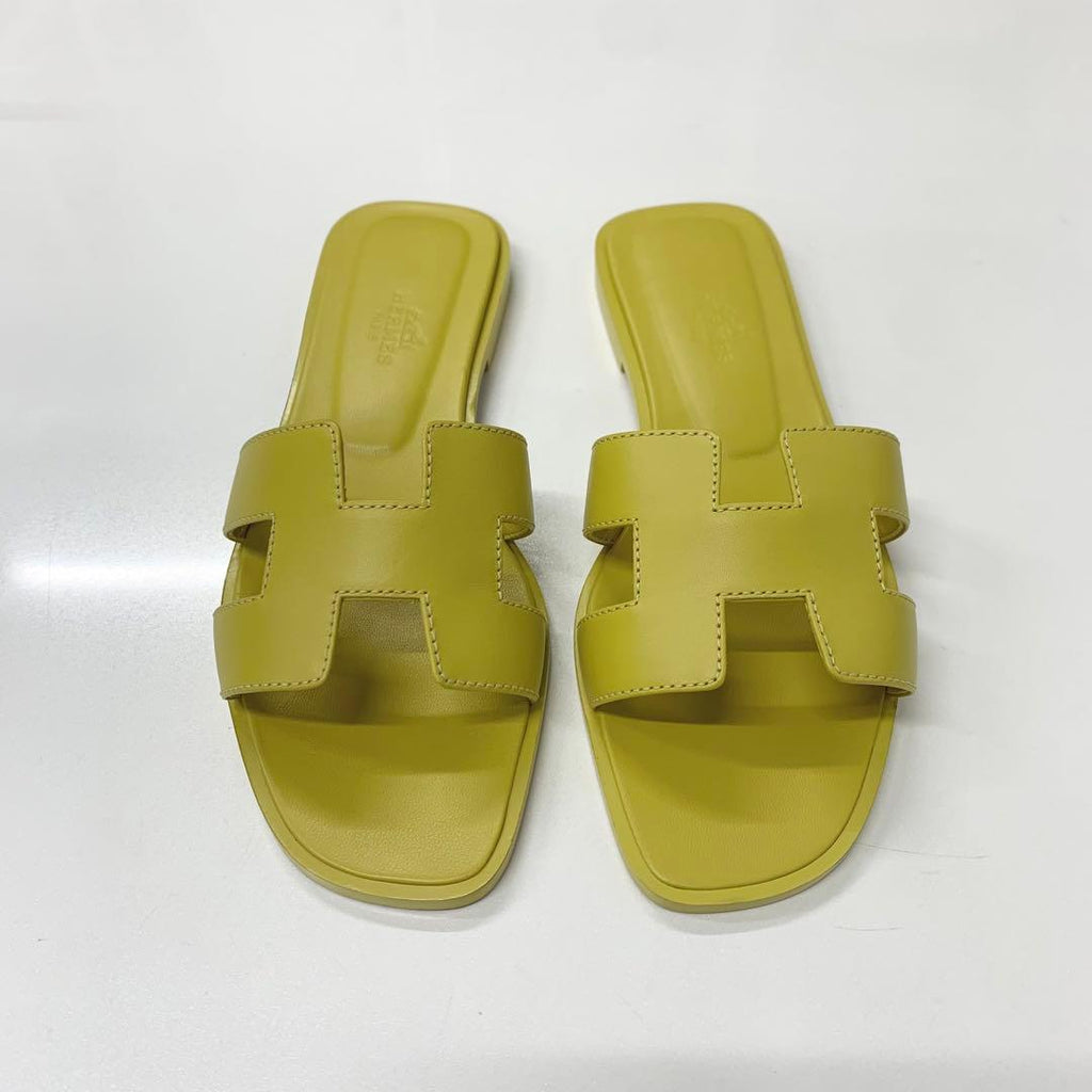 Hermes Oran Leather Flat Sandals Yellow — view 2