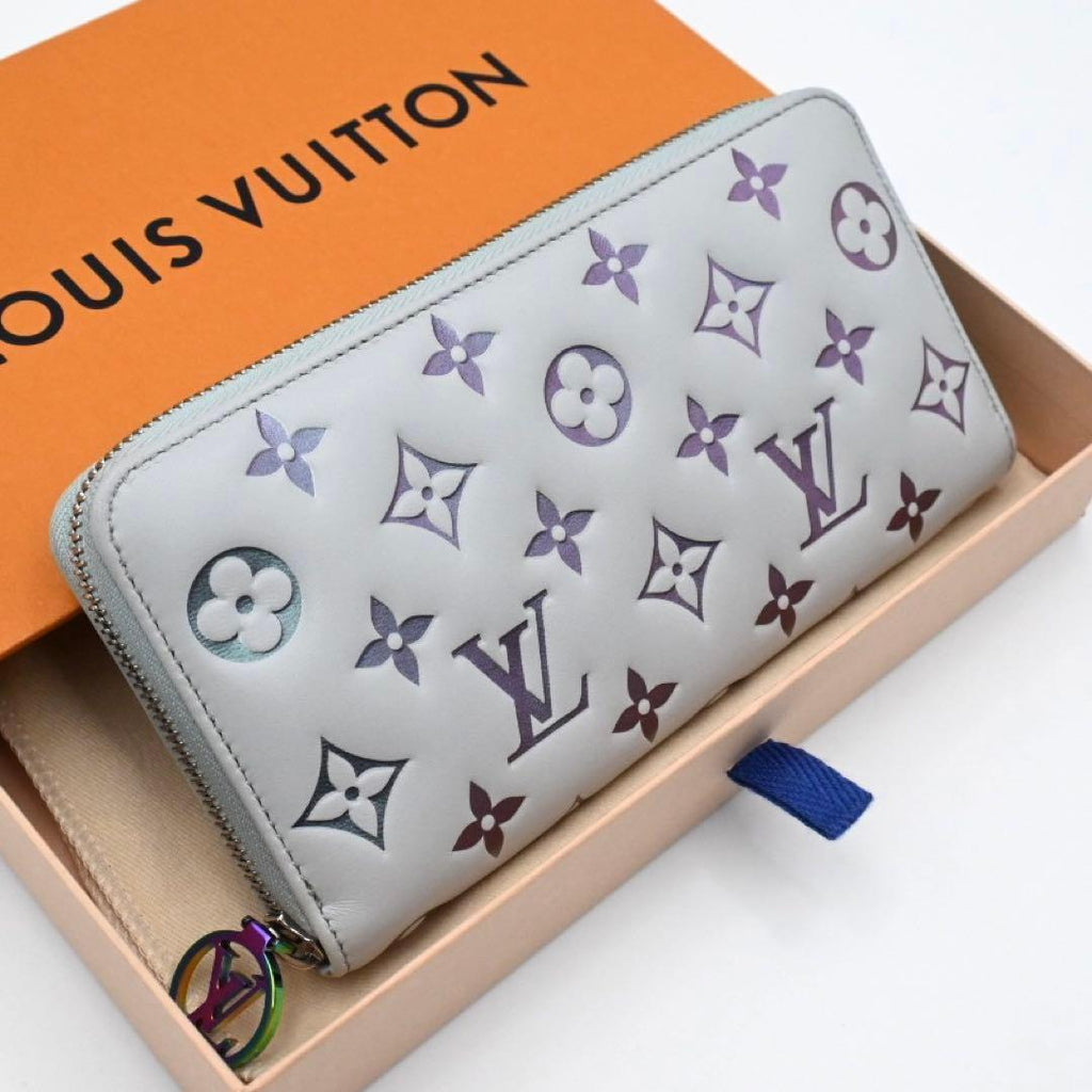 Louis Vuitton Lambskin Coussin Ski Zippy Wallet