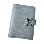 Louis Vuitton Vertical Compact Wallet Capucines Bifold