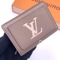 Louis Vuitton Monogram Empreinte Bicolor Clair Bifold Wallet