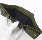 Gucci Embossed Logo Leather Trifold Wallet — view 6