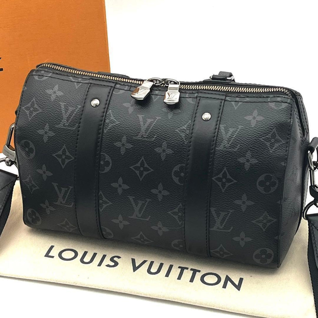 Louis Vuitton Monogram Eclipse City Keepall Shoulder Bag That Goes With Any Outfit