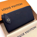 Louis Vuitton Taurillon Portefeuille Comet L-shaped Zip Around Wallet
