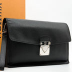 Louis Vuitton Belaia Taiga Clutch Leather