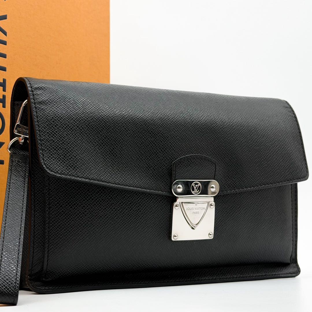 Louis Vuitton Belaia Taiga Clutch Leather