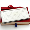 Louis Vuitton Portefeuille Brazza NM Taigarama White Wallet