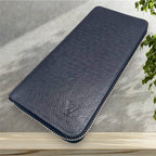 Louis Vuitton Taiga Vertical Zippy Wallet Navy