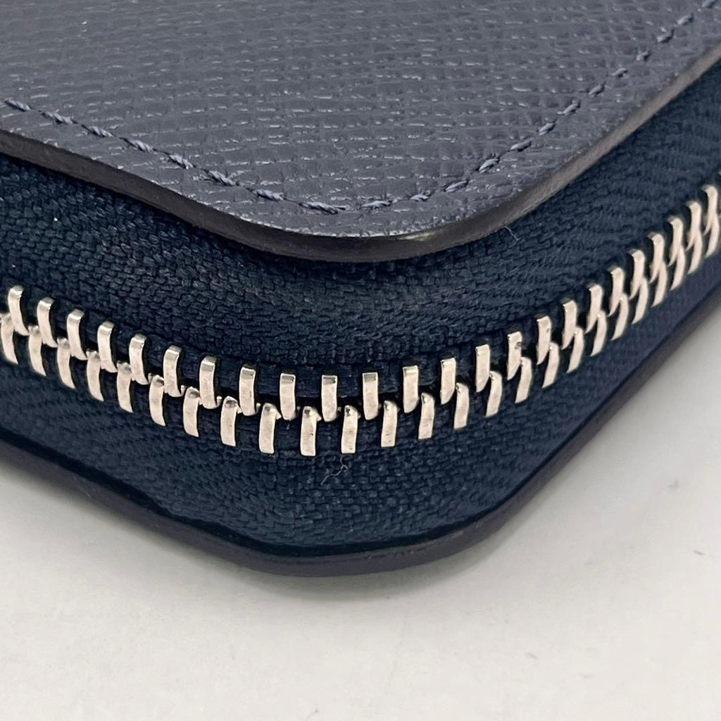Louis Vuitton Taiga Vertical Zippy Wallet Navy — view 9
