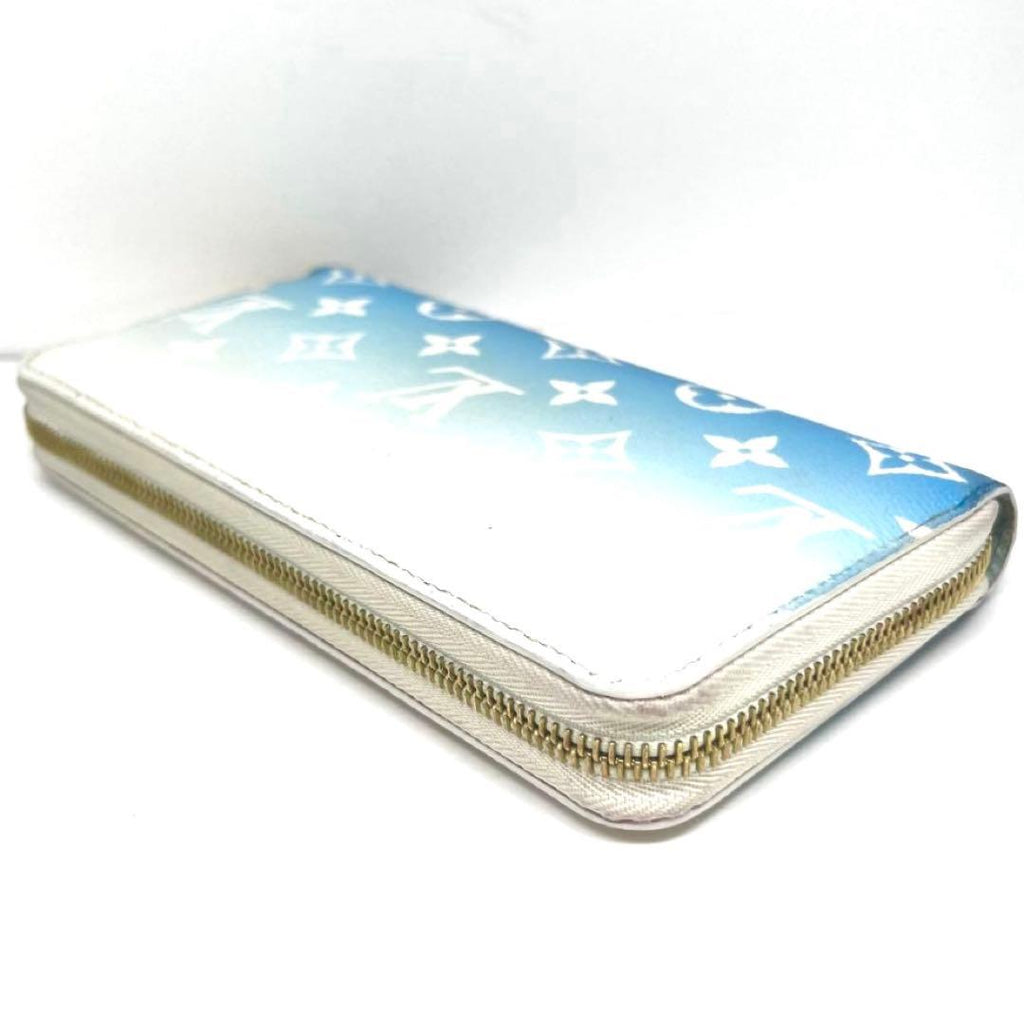 Louis Vuitton Monogram Giant Zippy Wallet by the Pool — view 8