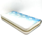 Louis Vuitton Monogram Giant Zippy Wallet by the Pool — view 8