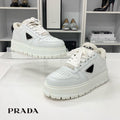 Prada Triangle Logo Leather Shearling Sneakers White