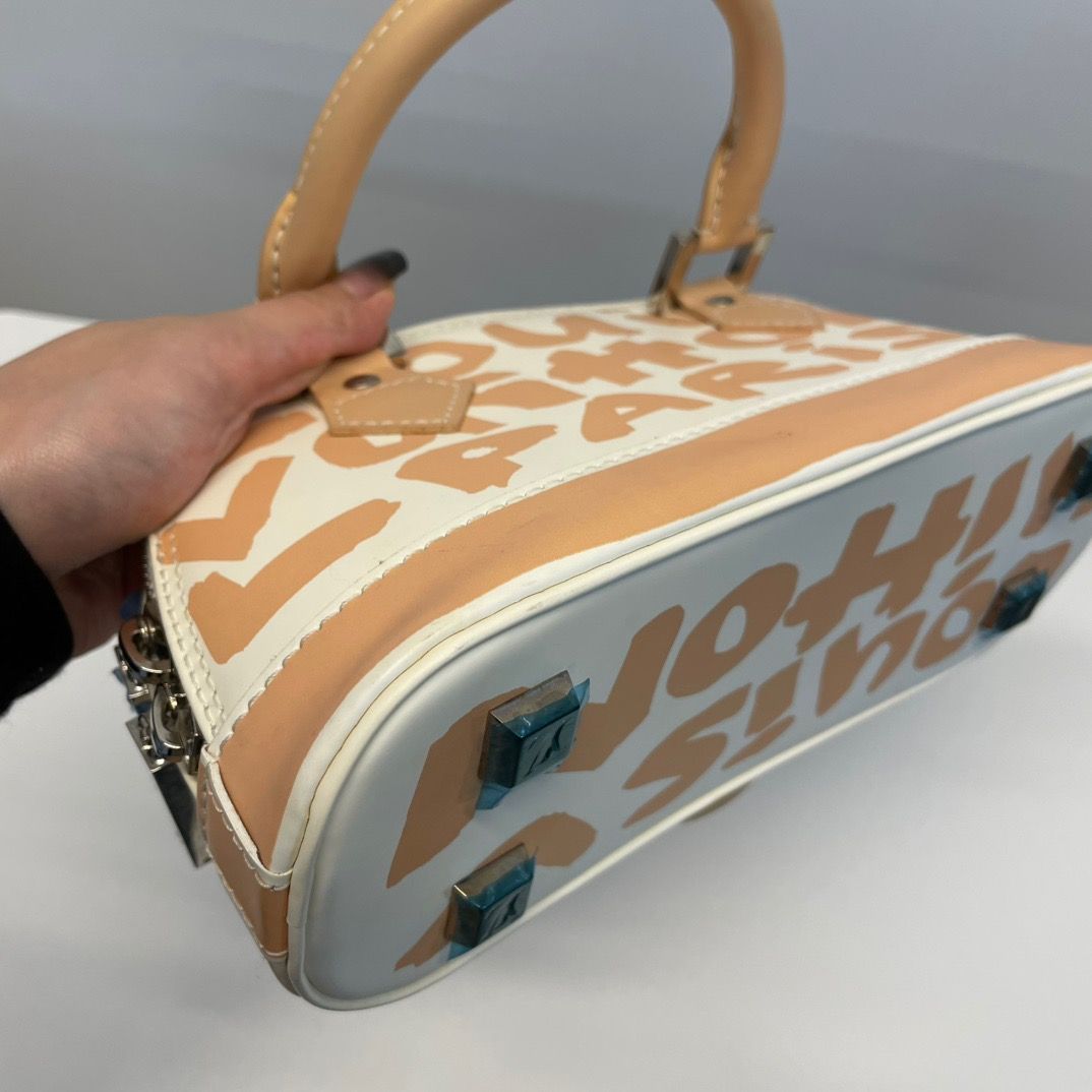 Louis Vuitton Alma Oriental Handbag — view 8