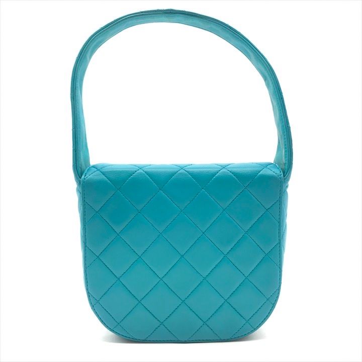 Chanel CC Logo Turnlock Quilted Lambskin Mini Hand Vanity Bag Blue — view 2